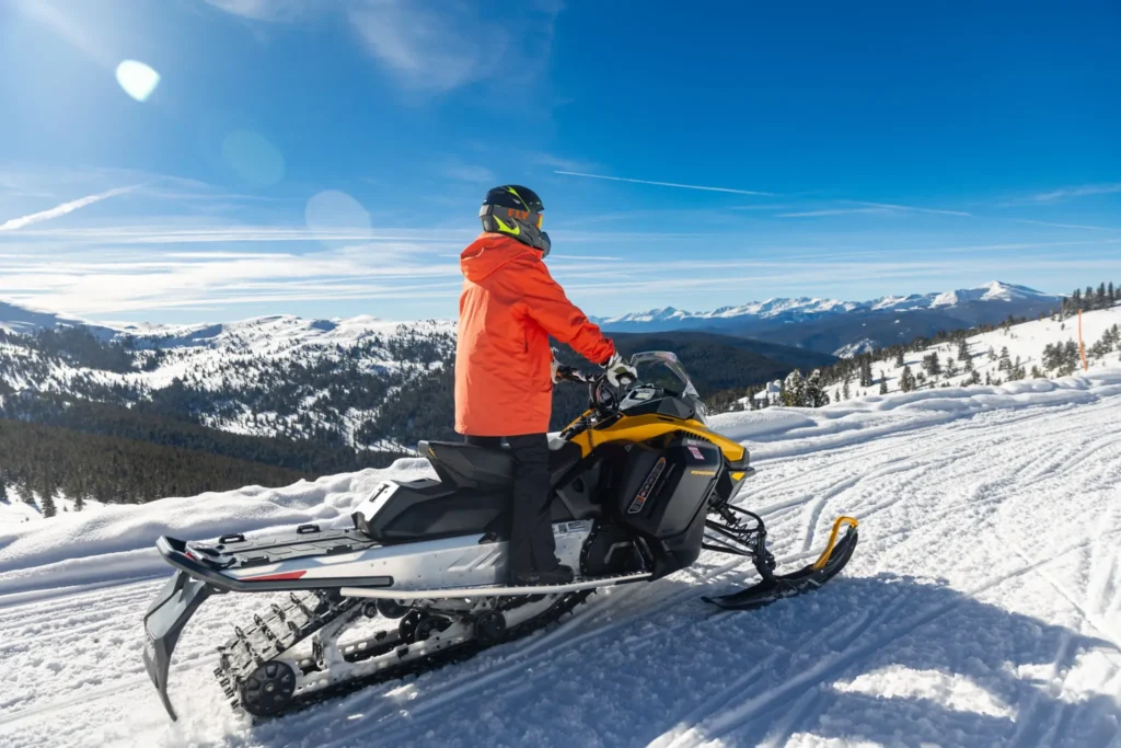 Single rider on a High Performance guided snowmobile tour at Fremont Pass near Copper Mountain, Colorado.